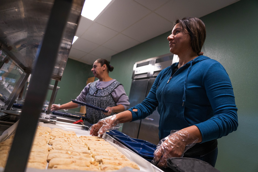 Student Nutrition workers serving food