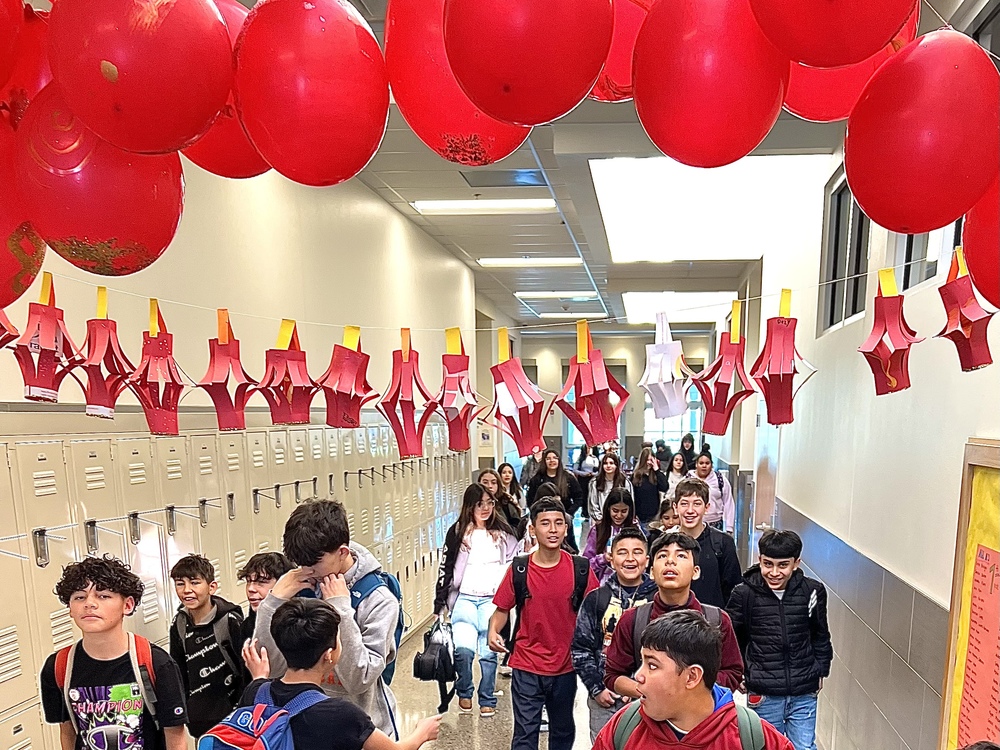 The hallway leading to the cafeteria was festooned with paper lanterns and balloons
