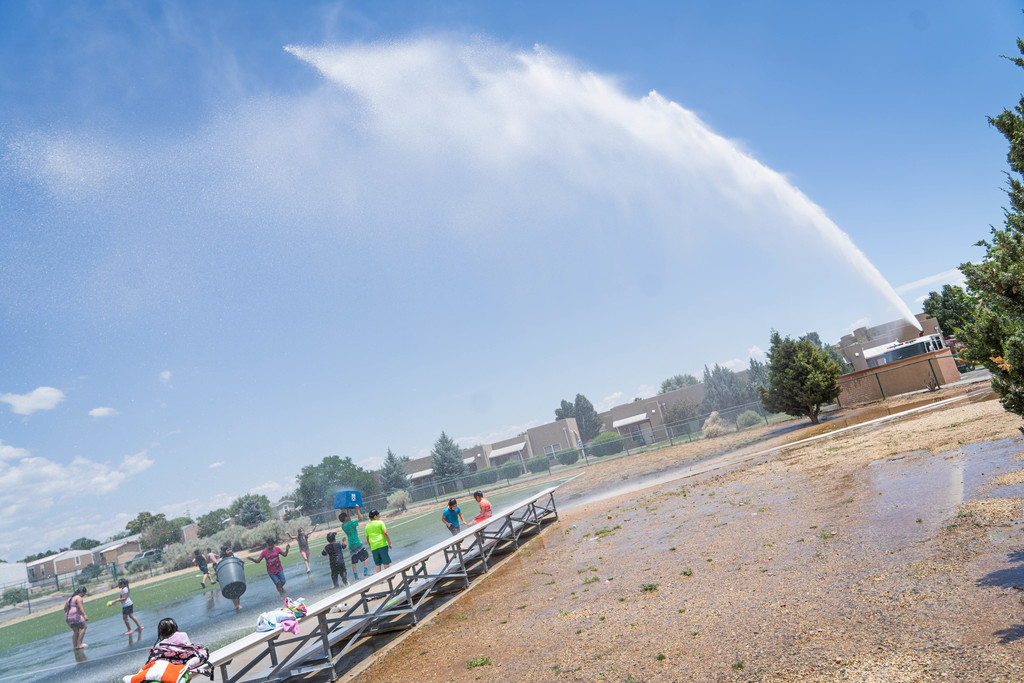 City of Santa Fe Fire Department spraying water on students