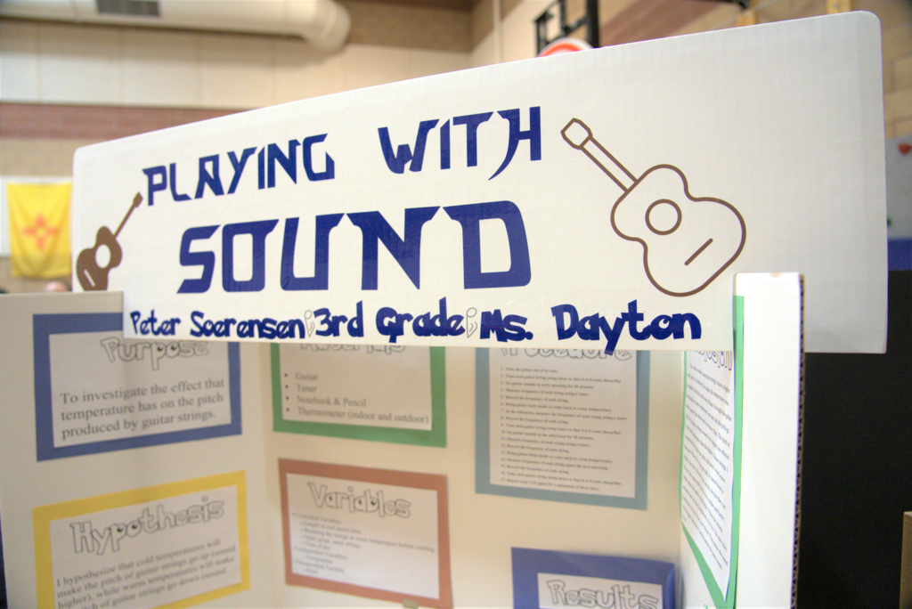 Science project display about playing with sound
