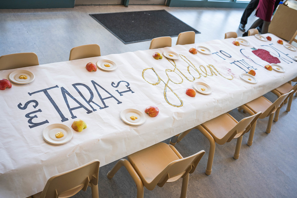 Ms. Tara is golden to the core on a tablecloth