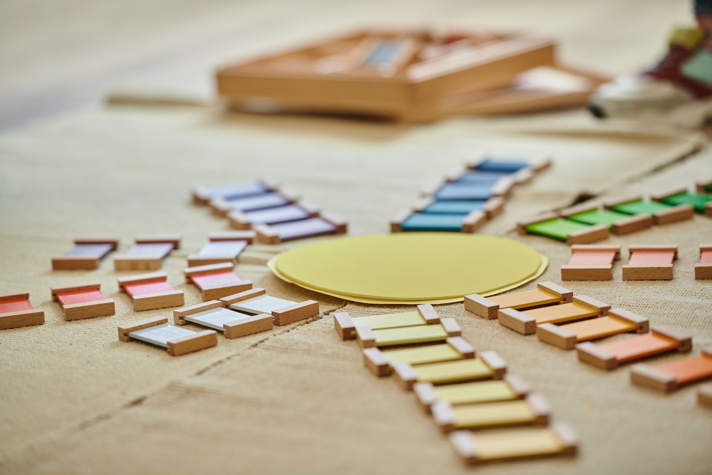 Montessori materials for teaching colors, sun shape, game, early school education, childhood